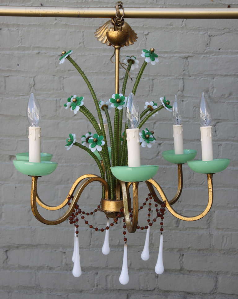 Italian six light gilt metal chandelier with green & white flowers, beads, and milk glass white drops. Newly wired with chain and canopy.