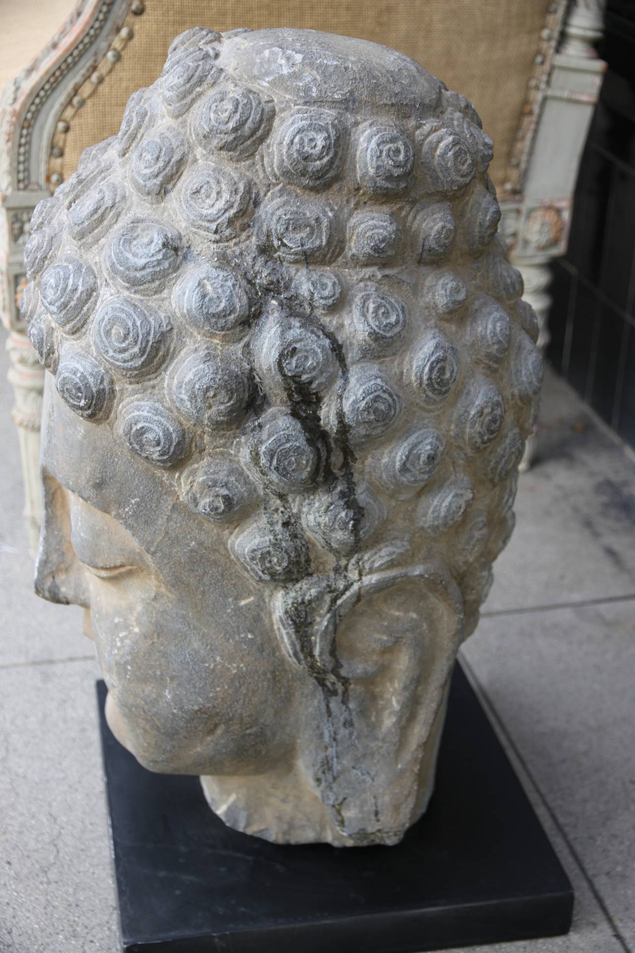Antique Sandstone Buddha on Steel Base In Distressed Condition In Los Angeles, CA