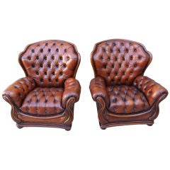 Pair of Carved French Leather Tufted Chairs C. 1930's