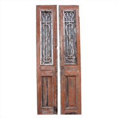 Pair of Antique Continental Carved Wood Doors with Iron Inset