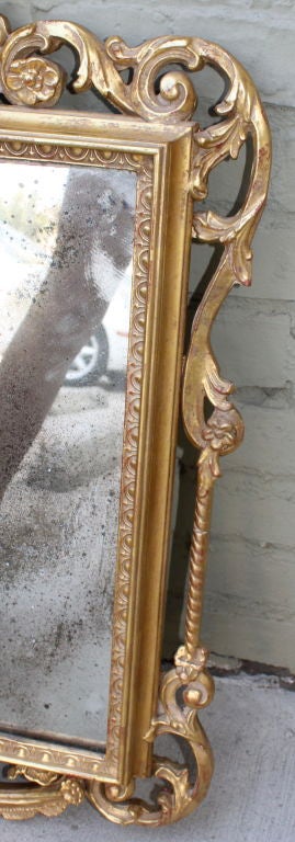 Mid-20th Century Carved Gold Gilt Italian Mirror with Aged Glass