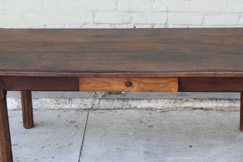 19th C. French Country dining table that has been modified and cut into a coffee table. Original drawer.