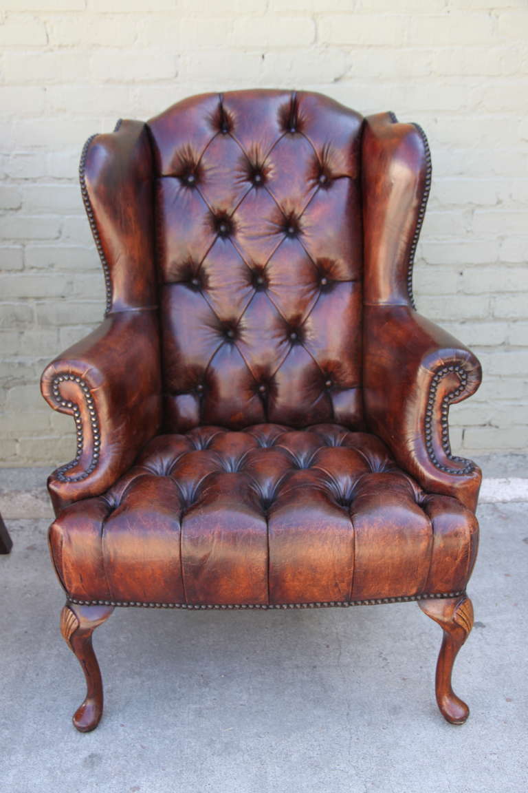 tufted leather wingback chair