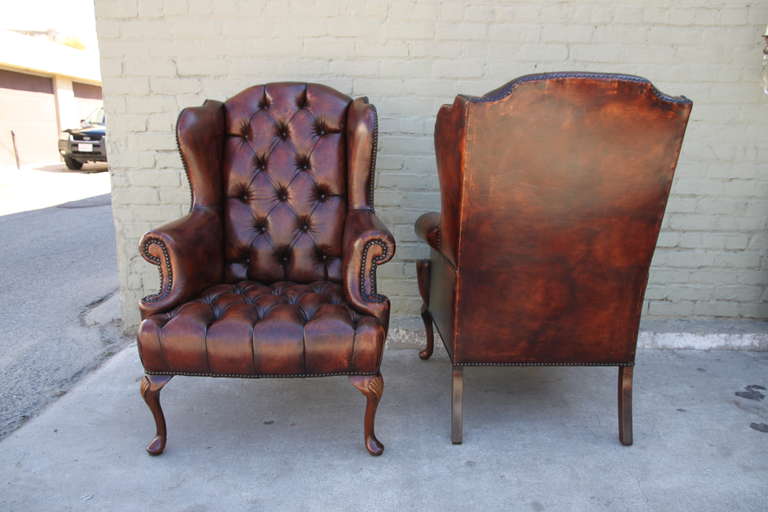 leather tufted chairs