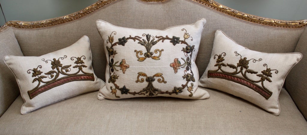19th C. Metallic & Silk Embroidered Appliqued Linen Pillows with cord trim. Down & feather insert.
