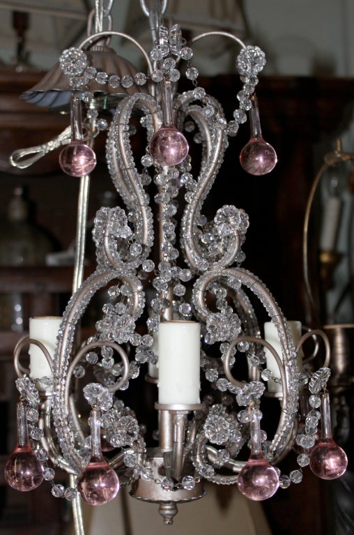 Petite four light beaded chandelier with pink drops.