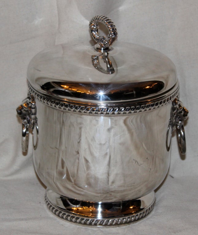 English Sheffield ice bucket with glass liner and petite tongs that attach to the inside of the lid.