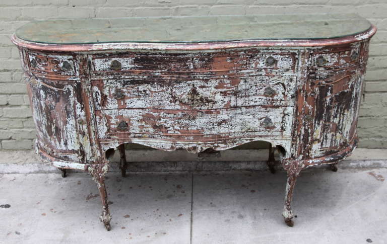 19th century painted French painted sideboard with antiqued mirror top standing on four cabriole legs with casters.