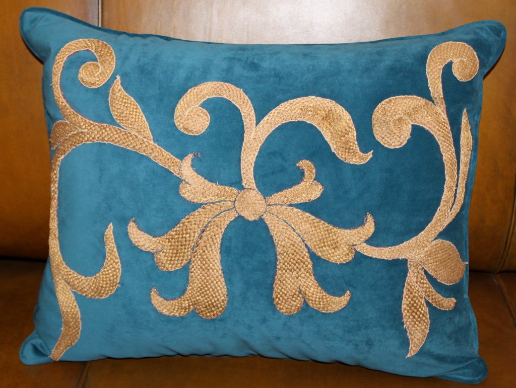 Pair of dark teal velvet pillows appliquéd with handmade gold metallic textile. Down and feather inserts.