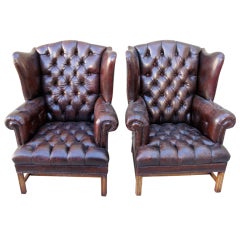 Antique Pair of Leather Tufted Wingback Armchairs