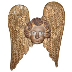 Carved Italian Gilt Wood and Painted Winged Cherub Face