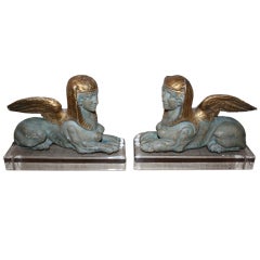 Pair of Painted and Parcel Gilt Sphinxes