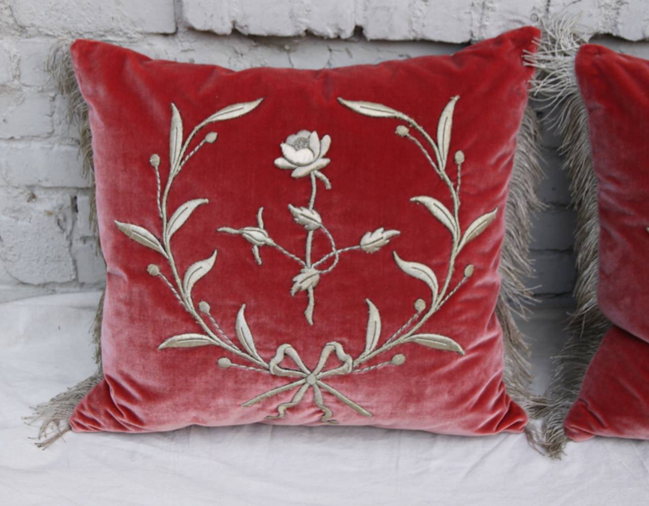 Pair of 19th century silver metallic appliqued sewn on contemporary coral colored silk velvet.