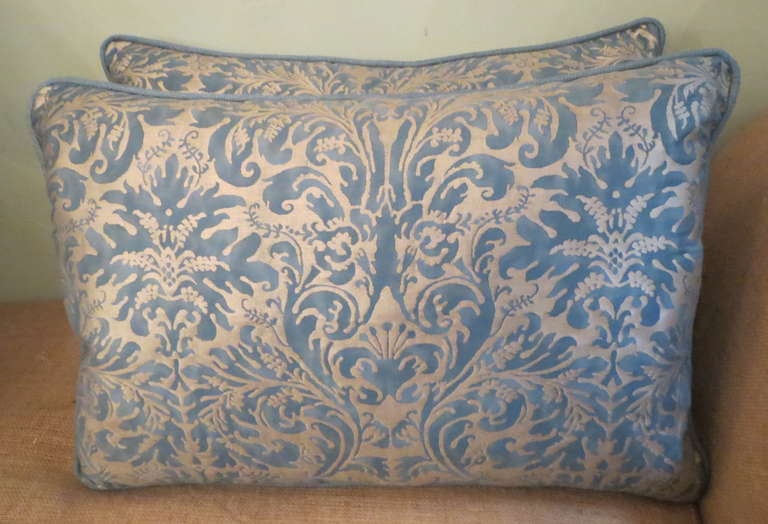 Pair of blue & metallic silvery gold Fortuny pillows with linen silk blue backs and self cording. Down insert.