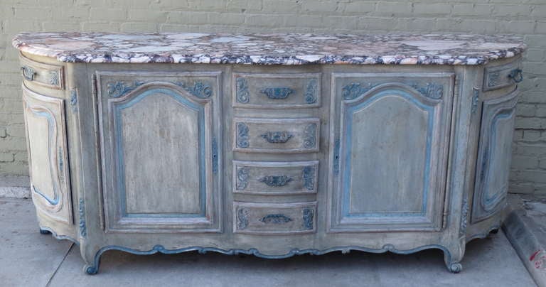 Grand scale French hand-painted credenza in soft shades of blue and grey with original antique marble top. Great storage throughout. Iron hardware.