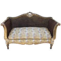 Antique Carved Giltwood and Caned Sofa