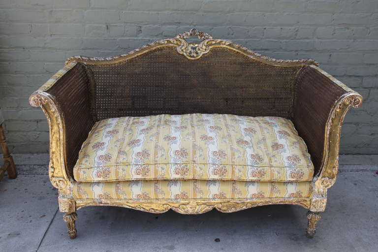 Carved Giltwood and Caned Sofa