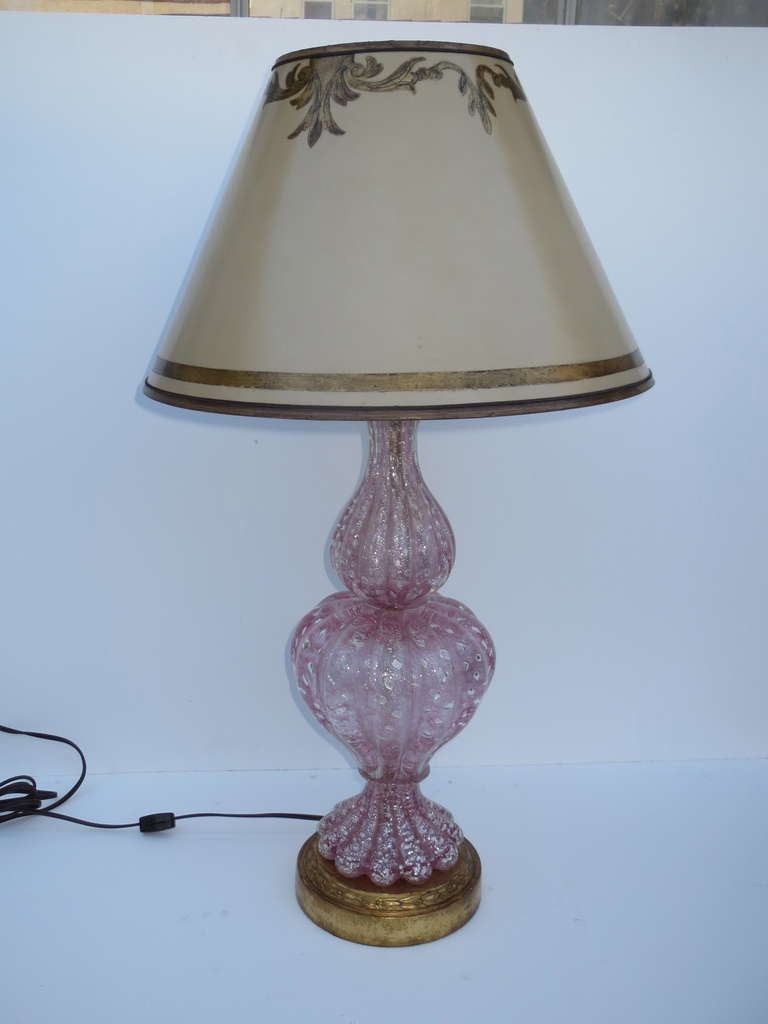 Pair of pink and silver spec Murano lamps on gold leaf bases and crowned with hand-painted parchment shades.