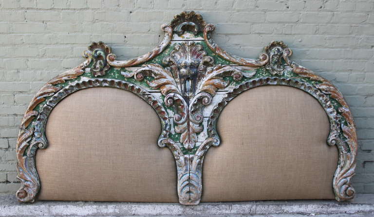 19th century French carved painted king size headboard made from antique circus lion's cage. Newly upholstered in burlap textile.