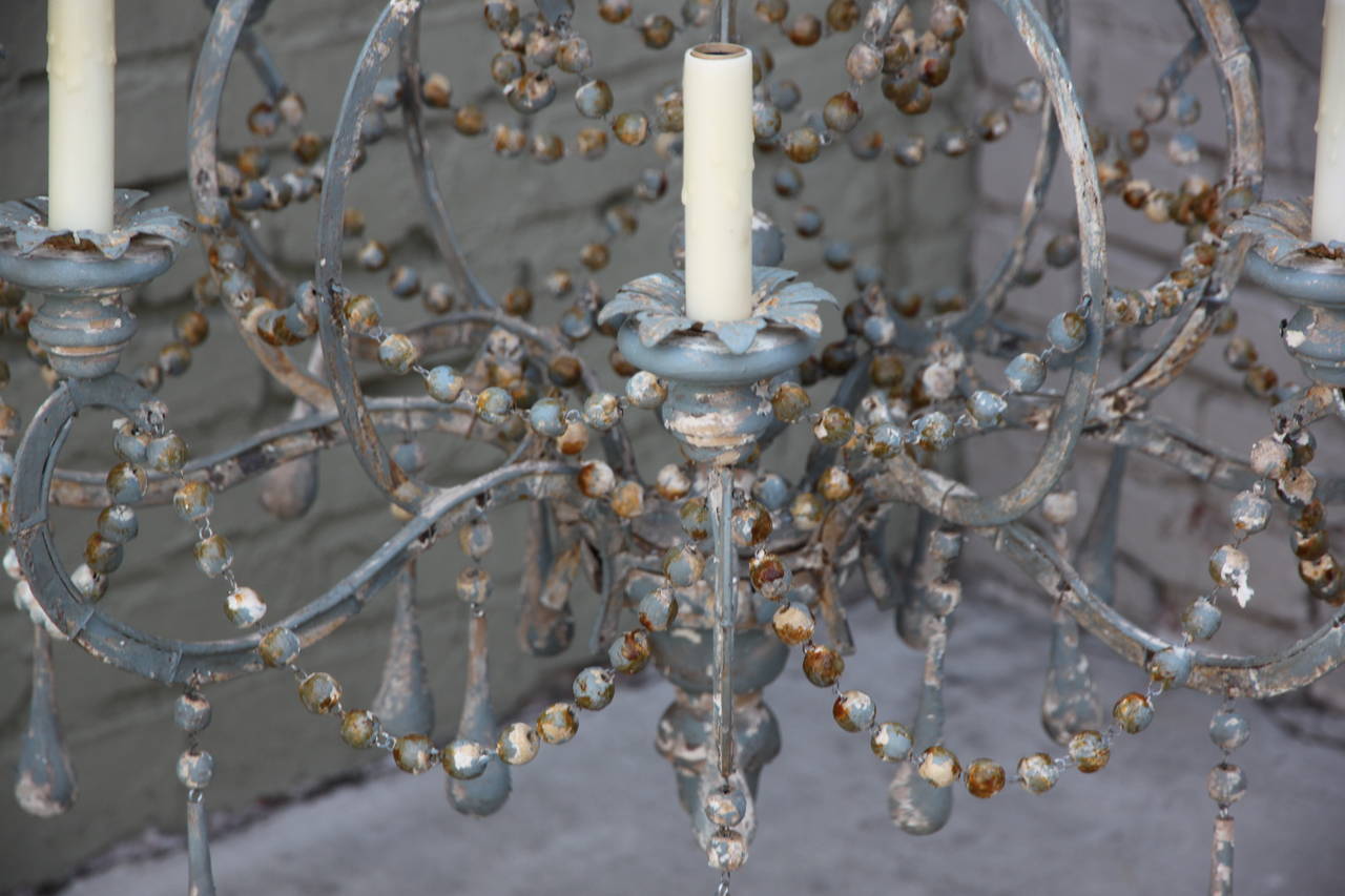 Italian Iron and Wood Beaded Eight-Light Painted Chandelier