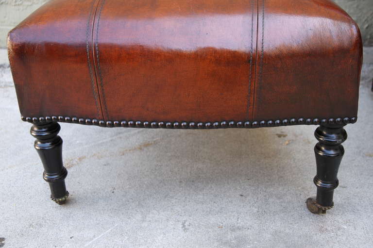 Pair of Leather Upholstered Side Chairs Standing on Casters 1