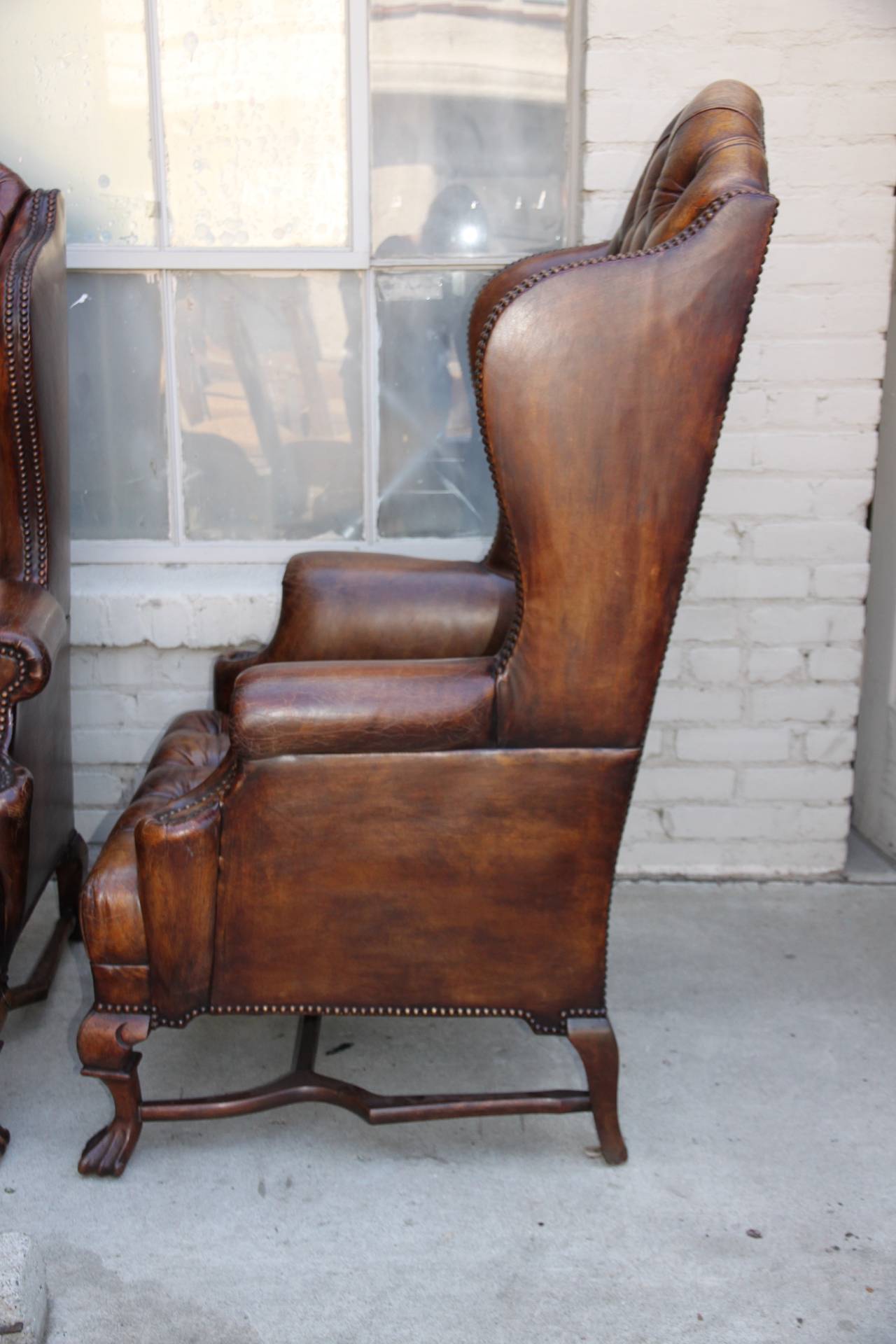 Early 20th Century Pair of English Leather Tufted Armchairs