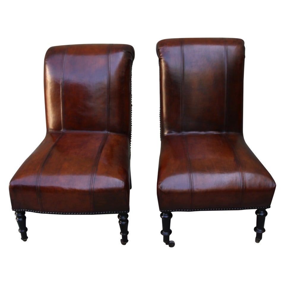 Pair of Leather Upholstered Side Chairs Standing on Casters