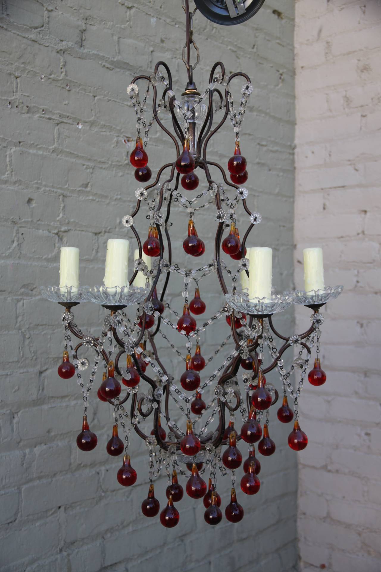 Italian crystal beaded ruby red drop & macaroni 6-light chandelier.  Newly wired and in working condition. Includes chain & canopy.