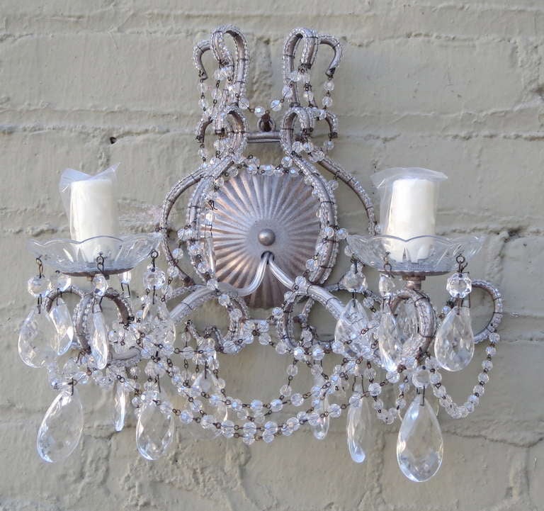 Pair of silverleaf macaroni beaded crystal two-light sconces. They are newly wired and in working condition.