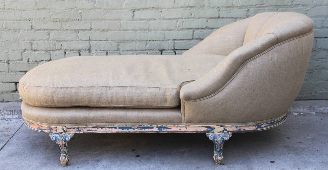 19th century French painted chaise upholstered in burlap textile with channeled back and double self welt detail. Loose down filled cushion.