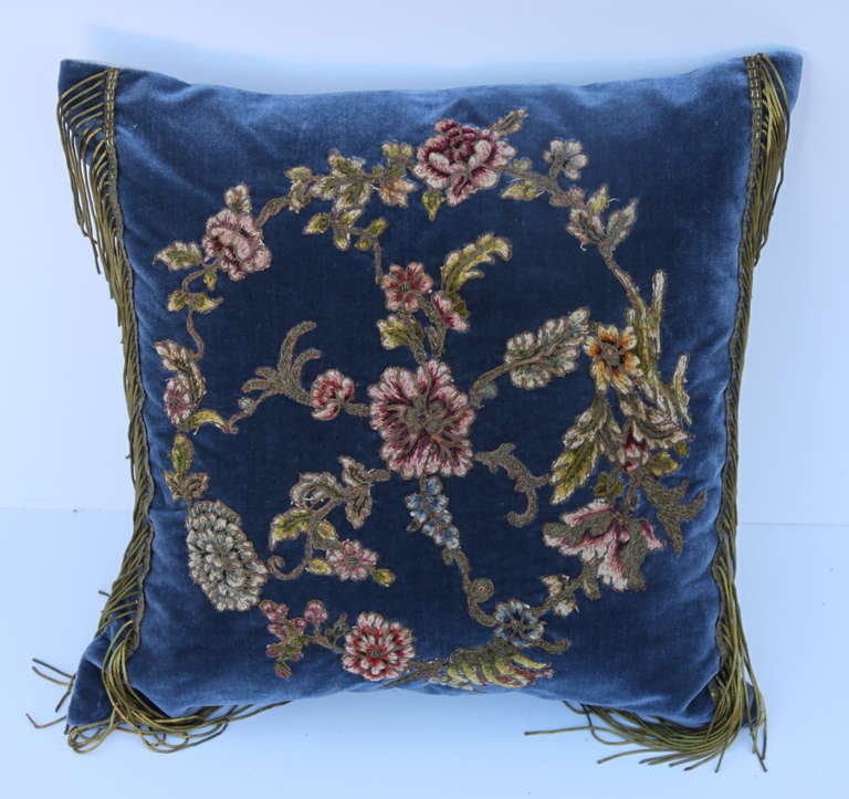 Pair of 19th century metallic & chenille embroidered flowers hand applied to blue silk velvet with antique gold metallic fringe.  Belgium Linen back in white coloration. Down insert. Sewn shut.