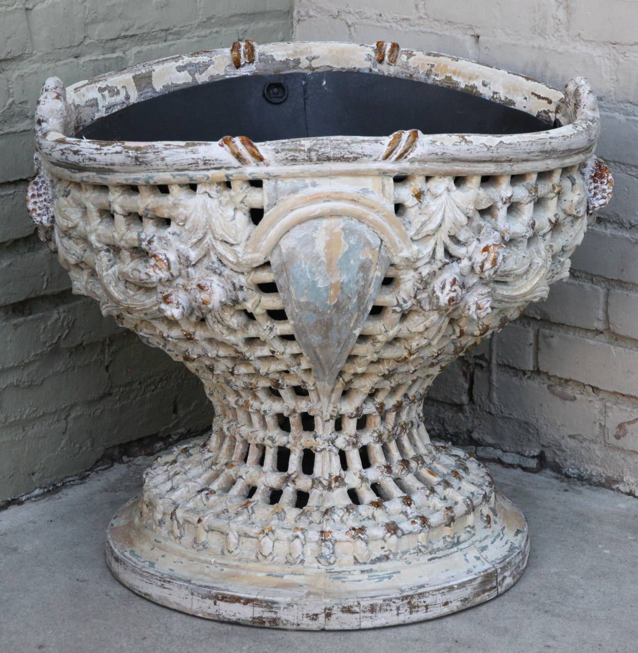 Pair of monumental carved painted French wood planters with metal liners.