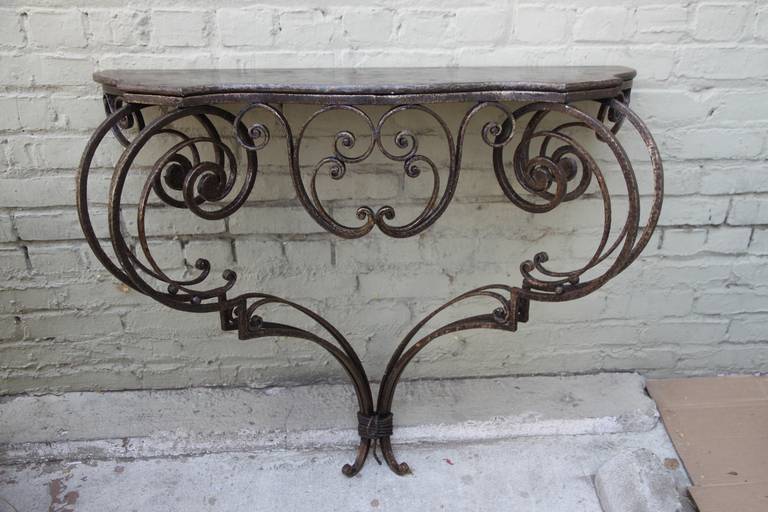 19th century French wrought iron console with distressed iron top.