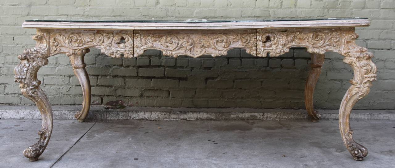 French painted Rococo style desk with centre drawer. Top is four antiqued mirror panels detailed with rosettes. The desk is beautifully carved and stands on four cabriole legs.