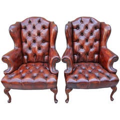 Pair of French Leather Tufted Armchairs