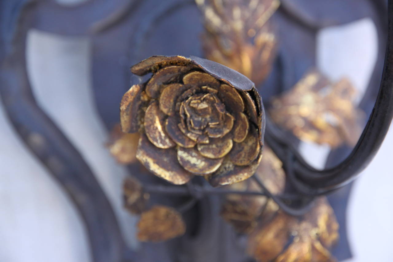 Wrought Iron Fleur-de-Lys Sconces with Gilt Flowers In Excellent Condition In Los Angeles, CA