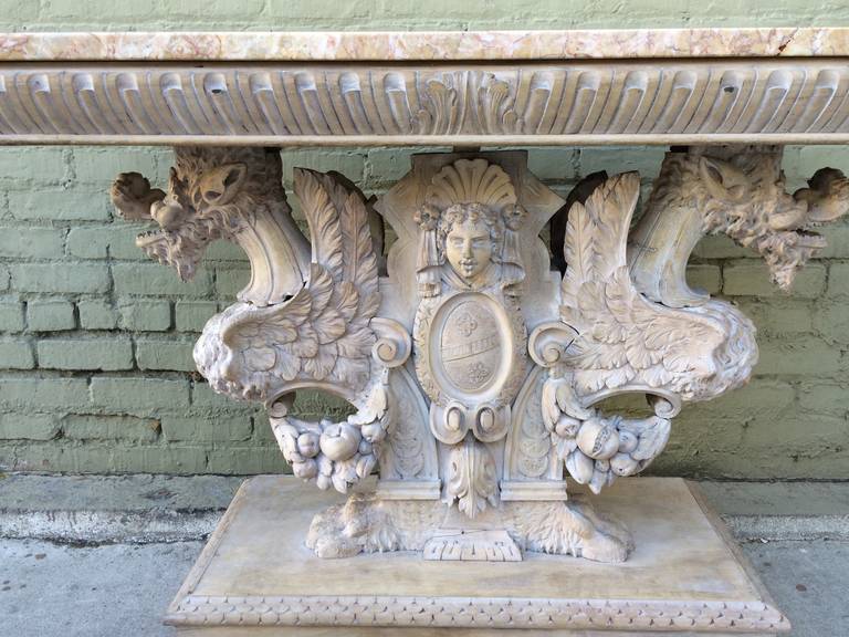 Italian Carved Wood Griffin Console with Marble Top In Distressed Condition In Los Angeles, CA