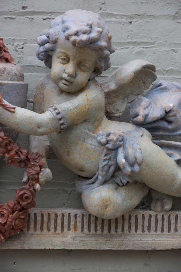 Pair of Italian Painted Cherubs with Wreath at 1stDibs