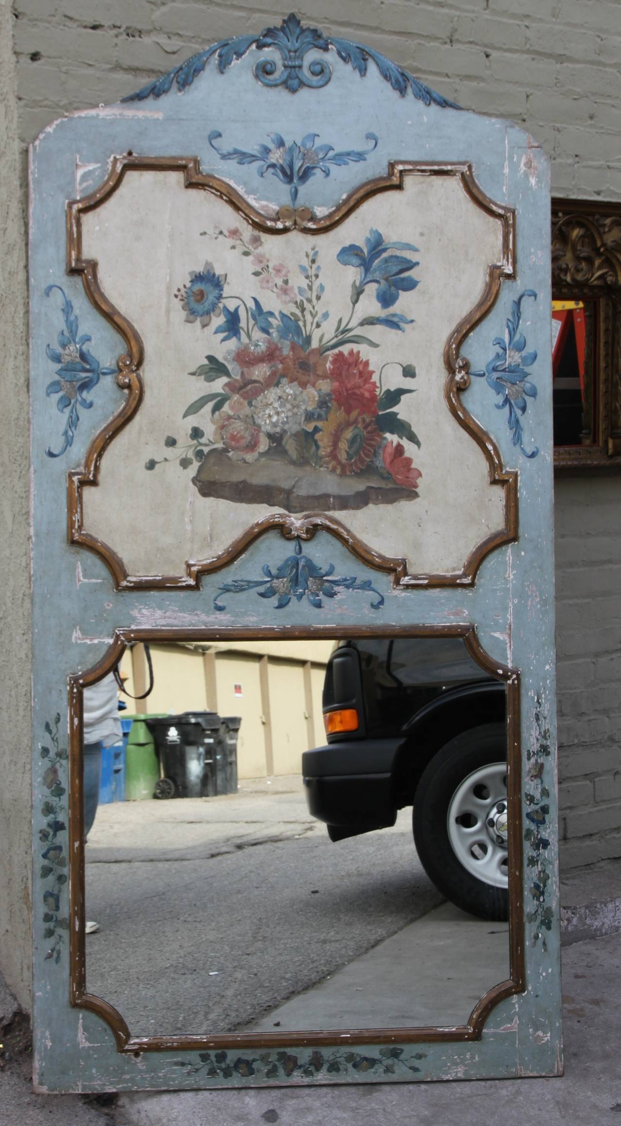 French painted floral mirror in beautiful shades of color.
