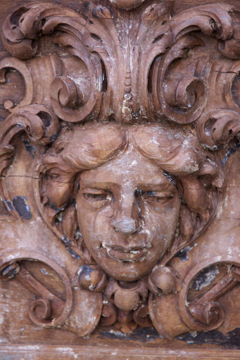 Italian Carved Headboard of Carved Face circa 1900 In Distressed Condition In Los Angeles, CA