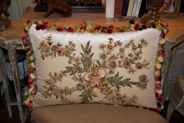 An original pillow by Melissa Levinson.  This is really one of my favorites.  A 19th century metallic & chenille embroidery appliqued on soft flesh colored silk velvet textile and finished with multicolored silk tassel trim. Down Insert. Sewn shut.