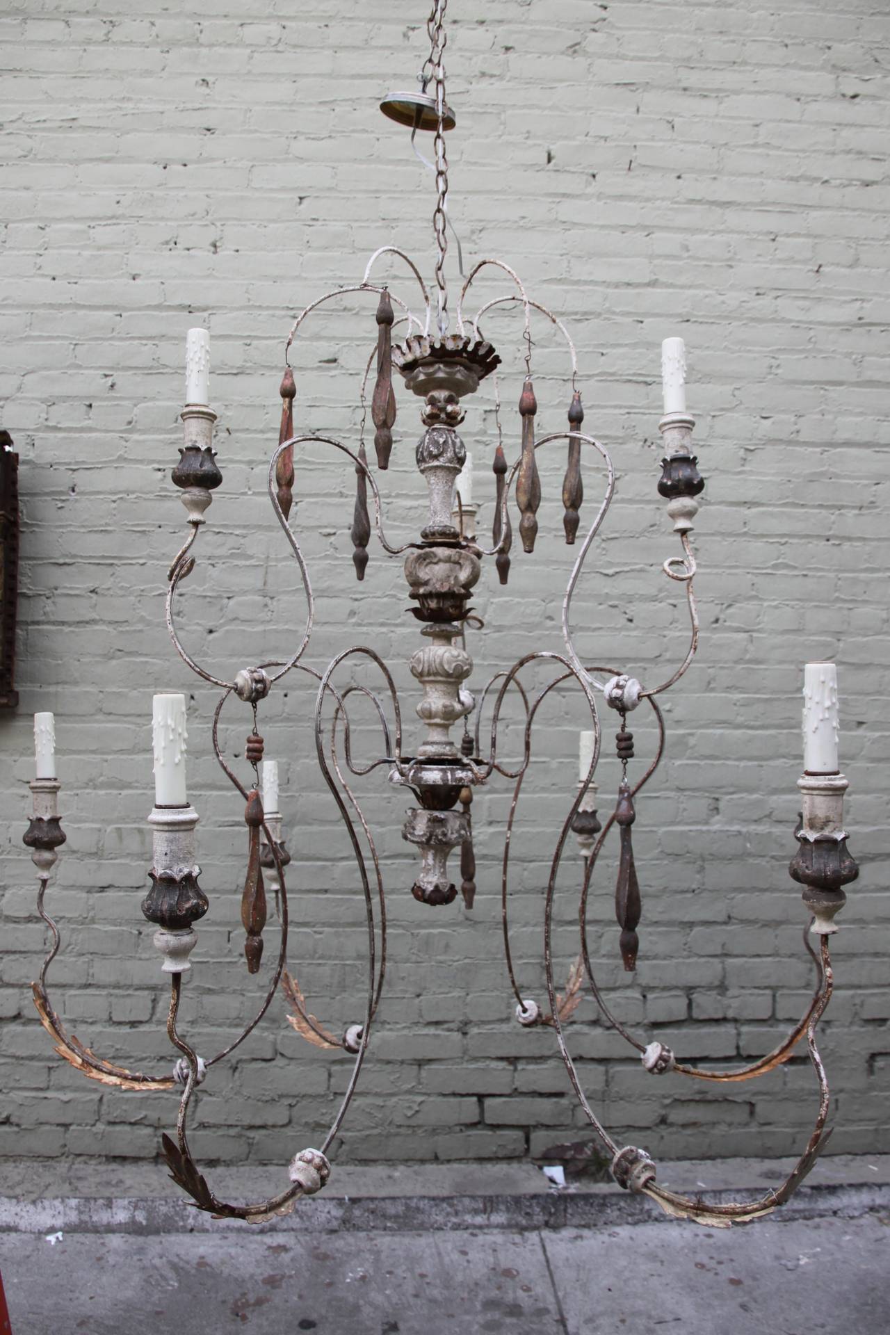 Nine-light Italian painted chandelier made up of antique elements. Newly wired with chain and canopy.