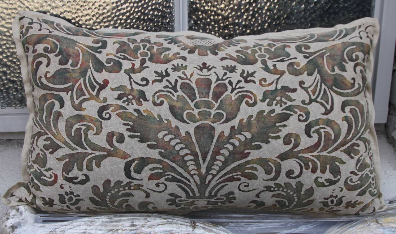 Pair of custom Fortuny textile pillows with cream linen backs and self-welt detail. Down inserts.