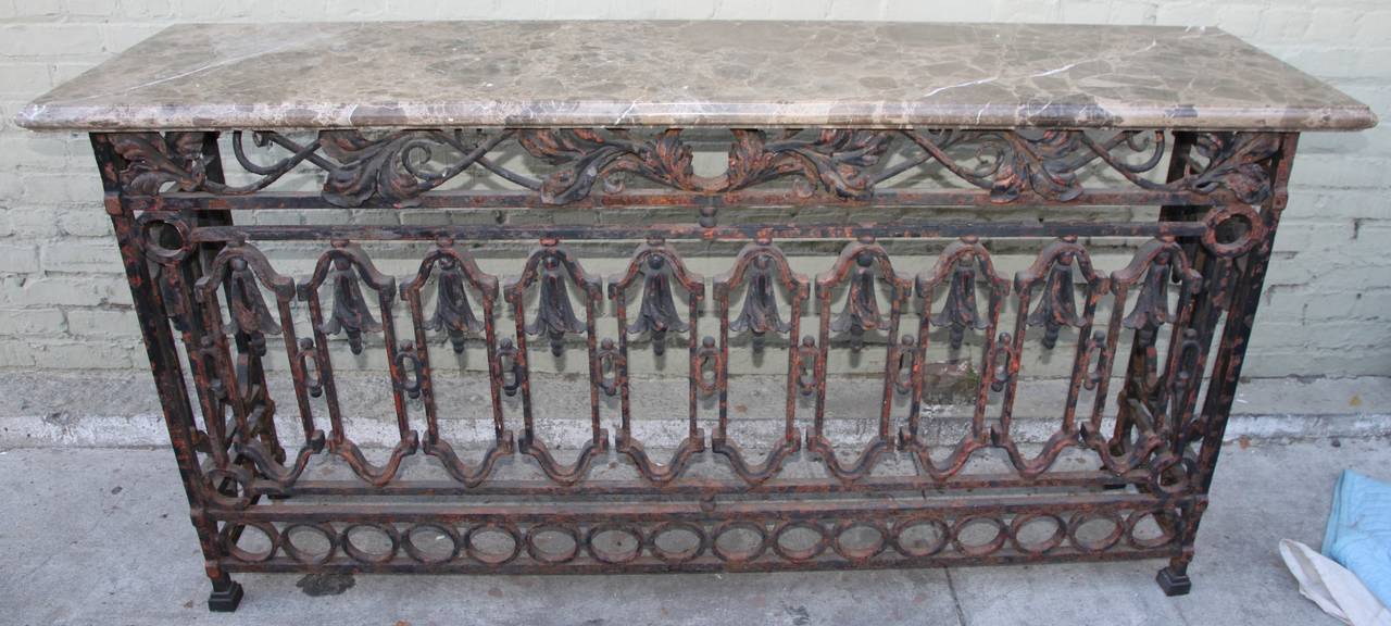 Pair of Spanish Revival Wrought Iron Consoles with Marble Top In Distressed Condition In Los Angeles, CA
