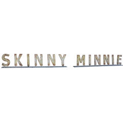 Skinny Minnie Metal Sign