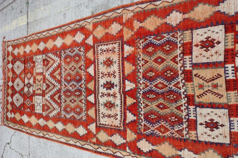 Wonderful long runner with great colors and bold field.We really think these Moroccan rugs are some of the coolest out there.