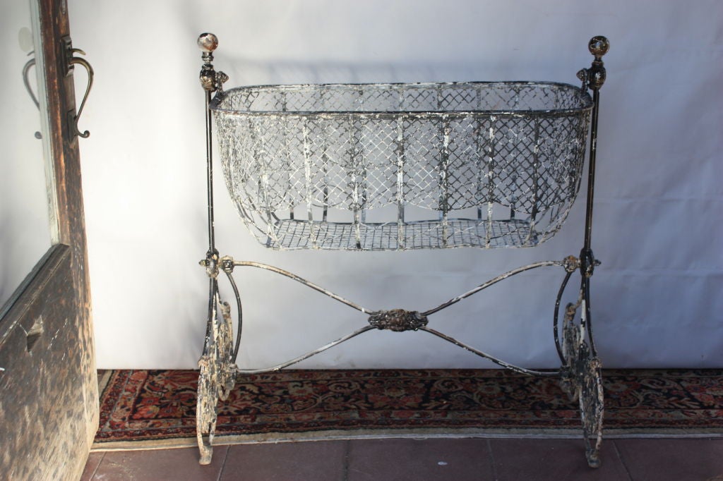 Great Victorian Rocking Cradle or Fancy Flower Basket.Removable wire basket.Several layers of old paint.