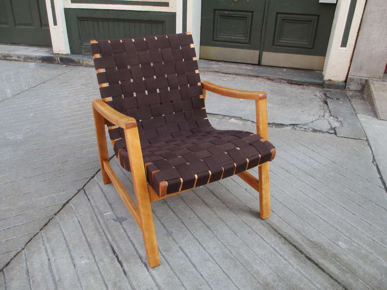 Solid birch Jens Risom armchair with new old stock chocolate brown  cotton strapping not the currently available nylon strapping from Knoll.