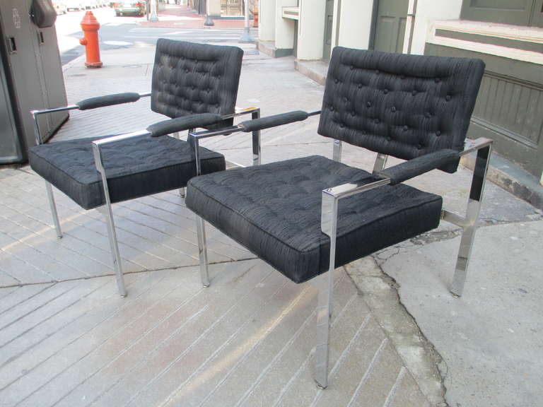 Baughman's open armed lounge chairs with floating back and square tubular frames of chromed steel. Fabric is older but not original and dark charcoal in color.  Chrome is perfect!