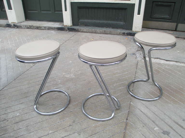 Nice Set of Chrome and leather Stools by Troy Sunshade of Troy Ohio.  Gilbert Rohde designed some of his best Pieces for this company in the 30's  These Iconic Stools are in really nice original condition with new leather cushions.